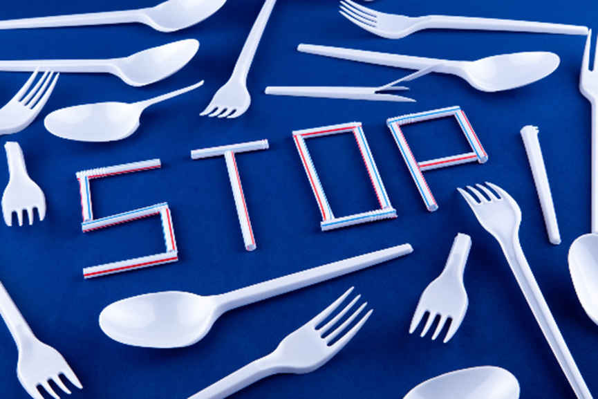 Plastic utensils with a message to stop using them