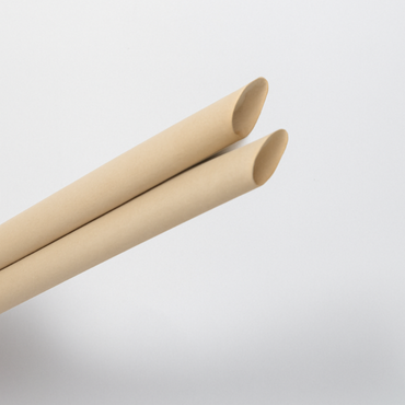 Close-up of bamboo fiber straws with angled tips, eco-friendly and biodegradable.