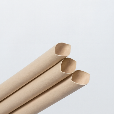 Close-up of eco-friendly biodegradable paper straws, ideal for sustainable drinking.