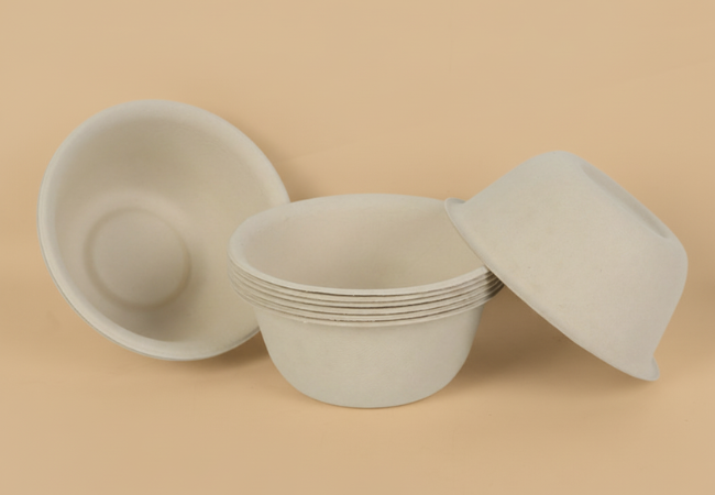 Stack of disposable bamboo fiber bowls, eco-friendly and compostable