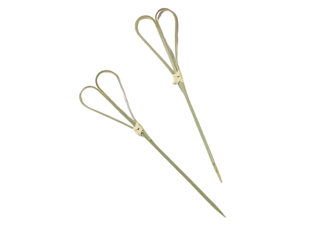 Two natural double-loop bamboo knot skewers isolated on a white background.