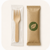 Wrapped disposable cutlery in clear and paper packaging for takeaway foodservice